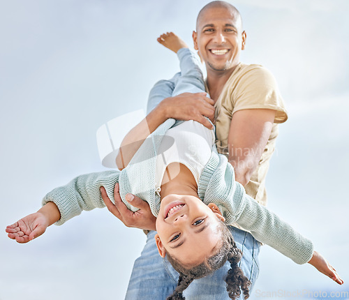 Image of Happy, summer with father and girl playing together with love, care and happiness. Upside down child with a happy smile with dad spending quality time outdoor having kid fun in the sun on vacation