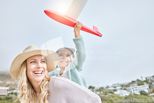 Image of Happy, mother and Girl with airplane toy on travel vacation seaside for fun activity with adoption. Smile, woman and kid on tropical family holiday in costa rica with daughter and mom enjoy playing