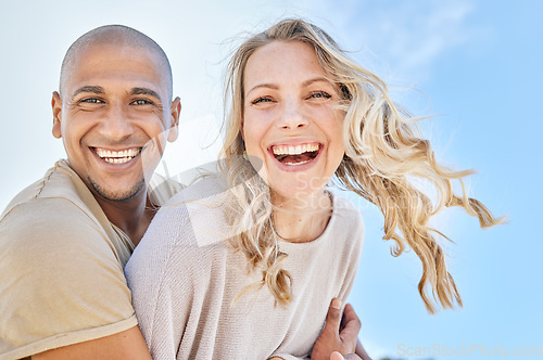 Image of Love, blue sky and diversity couple hug, laugh and enjoy fun quality time together on travel vacation date. Happy, smile and romantic black man, woman or excited people bond on Toronto Canada holiday