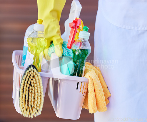 Image of Cleaning, tools and cleaner carrying basket with liquid soap, brush and detergent spray bottle. Closeup of products for washing, hygiene and clean supplies for housekeeper, maid or domestic worker