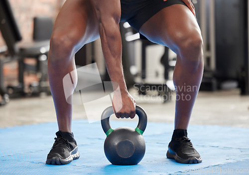 Image of Gym, strong and fitness hand with kettlebell for body builder training, workout and cardio. Bodybuilder, exercise and muscle strength and endurance practice for athlete man at wellness club.
