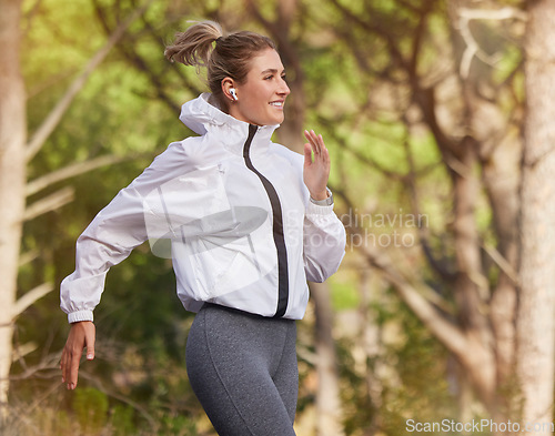 Image of Exercise, woman and running for health, wellness or workout for fitness, happy or outdoor. Female athlete, healthy girl or runner doing cardio, training or smile in sportswear for workout or marathon