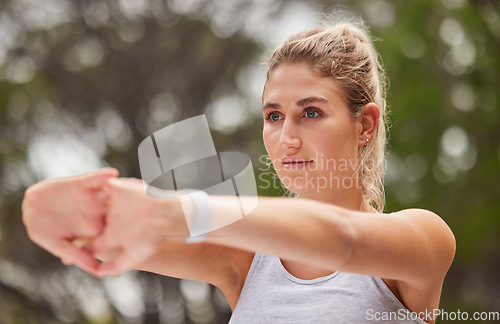 Image of Woman, stretching and fitness outdoor, arm with exercise and workout, ready to run or yoga with pilates for active lifestyle training. Young healthy athlete, focus and warm up, cardio and endurance.