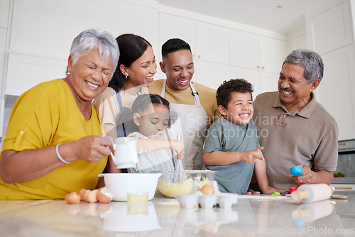 Image of Baking, comic and big family in the kitchen for food, cooking and happy together in their house. Funny children with parents and grandparents learning to make cookies, cake or lunch with smile