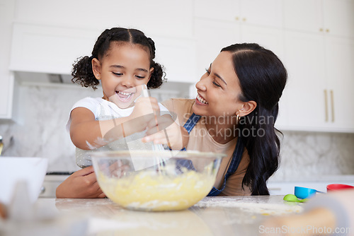 Image of Development, mother and girl in kitchen, cooking and baking for learning, growth and being happy together at home. Mama, daughter and child have fun while education, food and with happiness in home.