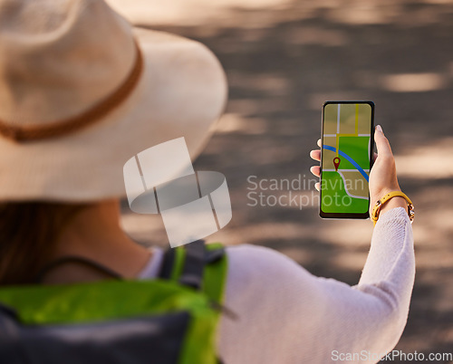 Image of Internet map, phone and woman in nature for adventure, travel and hiking on holiday in Costa Rica. Back of person with a gps location on a mobile while walking or trekking in the mountains or forest