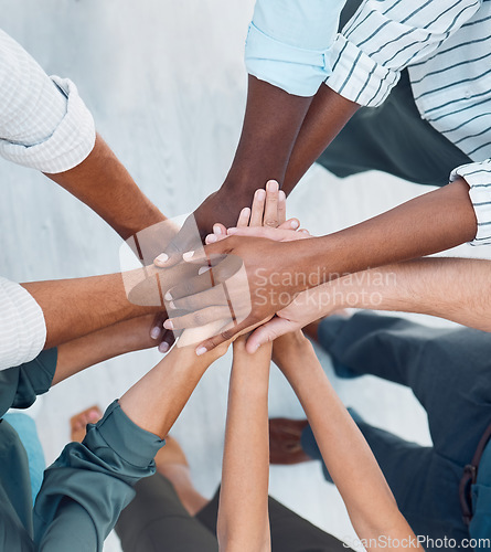 Image of Diversity, hands and team above in support, trust and unity for collaboration, agreement or meeting at the office. Group hand of diverse people in teamwork, cooperation and solidarity for community