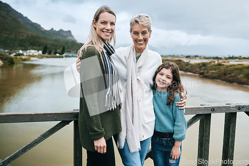 Image of Portrait of grandmother, mother and girl on bridge happy and enjoying family vacation, Travel, journey and adventure with parents, kid and grandparents standing by lake on holiday, travelling and joy