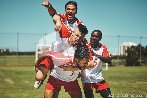 Image of Soccer player, soccer and soccer field, winner and team, diversity and celebrate goal, athlete happy and sports win. Sport, fitness and young men celebrating, outdoor game and team spirit, piggy back