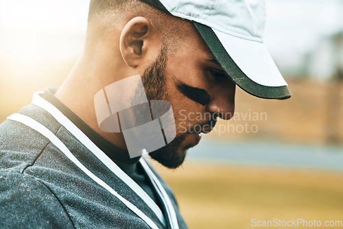 Image of Baseball player, face and thinking of game strategy in fitness, workout and training on grass field pitch. Zoom, sports man or softball player in match exercise with stress, anxiety or mental burnout