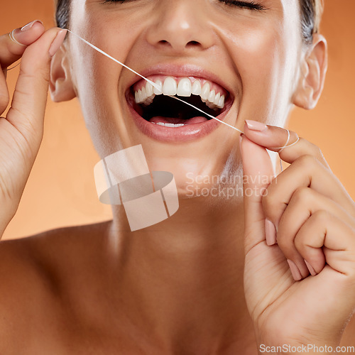 Image of Teeth floss, dental healthcare and mouth care of a happy woman smile about healthy practice. Happiness of a person using a clean, beauty and flossing oral treatment for clean results for Invisalign