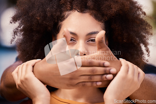 Image of Woman, silence and victim hand cover mouth for stop, quiet and domestic violence secret. Fear, rape and black woman suffering from horror, gender based violence and sexual abuse, stuck and hostage