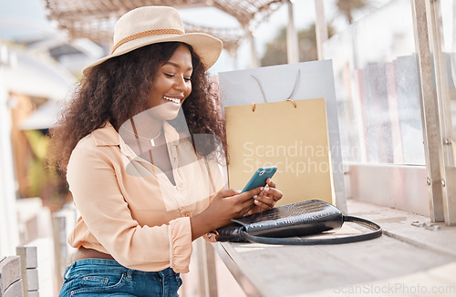 Image of Shopping bag, phone and black woman on mobile for social media, fashion or happy with 5g app. Beauty, luxury and wealthy girl with smartphone for ecommerce payment onilne while on holiday in miami