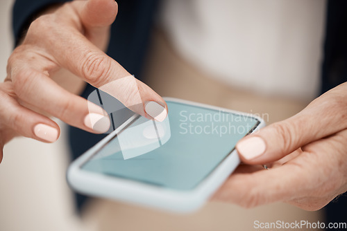 Image of Technology, hands and senior woman with a phone networking on social media or the internet. Communication, mobile and closeup of elderly lady doing research or scrolling on website with a smartphone.