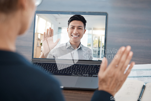 Image of Business people wave in a video call meeting via laptop networking, talking and planning a development project. Smile, communication and Asian employee in a b2b partnership with a corporate manager