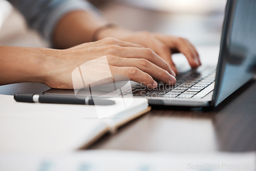 Image of Typing, hands and man doing work on laptop in office with notebook on desk. Technology, internet and businessman with computer writing emails, working on project and type documents on keyboard