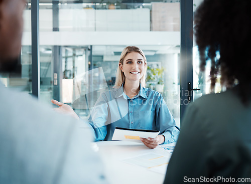 Image of Woman, documents and meeting with client in office for planning, discussion or strategy for business. Business meeting, talking and smile at table with paper for collaboration, deal or contract