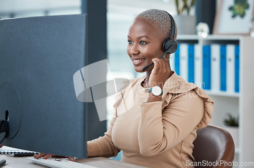 Image of Call center, contact us and happy consultant in communication, helping and talking in customer services. Smile, telemarketing and black woman networking and speaking to a client at a support desk