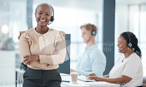 Image of Happy black woman, call center and contact us for customer service and telemarketing insurance agents at help desk. Smile, communication and team leader working for a global telecom sales company