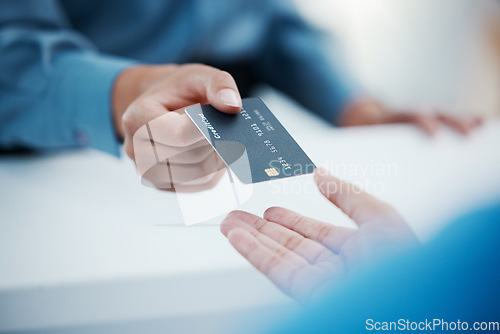 Image of Corporate hands exchange credit card to accountant for payment for company tax bills, money loan and accounting fees. Businessman with banking card to invest in financial savings budget investment