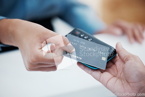 Image of Credit card, payment and nfc with the hand of a customer scanning a chip for a purchase in a retail store. Finance, money and fintech with a consumer paying using wireless technology for shopping