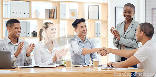 Image of Handshake, applause and congratulations, recruitment success at startup meeting. Hand shake, thank you and a corporate welcome to new recruit or partner for business deal, achievement or agreement