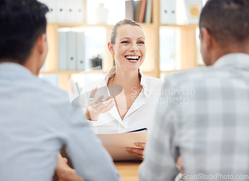 Image of Planning, strategy and manager in a meeting, working and talking to employees about a report on company growth at work. Happy, smile and young boss in communication with workers on corporate budget