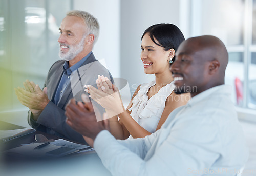 Image of Business, presentation and success celebration of a corporate team clapping in a meeting. Business meeting, teamwork and target goal completion of a working office group support with diversity