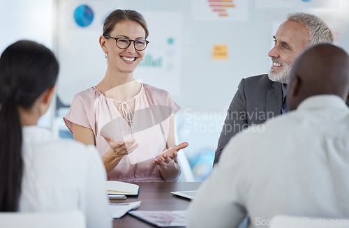 Image of Business people, team and meeting discussion for idea, conversation or company solution in analysis at the office. Happy woman employee analyst sharing ideas in collaboration, teamwork or workshop