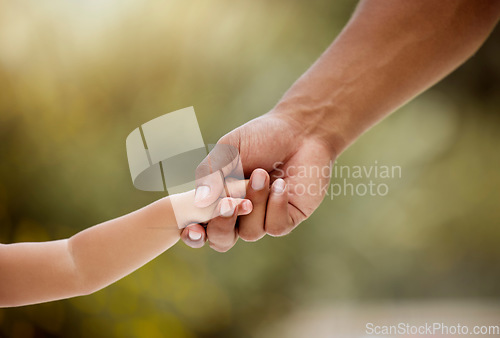 Image of Care, support and holding hands for youth, trust and generation against a blurred background. Hand of parent and child arms in caring relationship, help and love for childhood growth and development