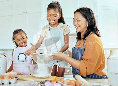 Image of Happy family cooking, mother and children help mom with egg, wheat flour and bake food in home kitchen. Love, youth kids teamwork on baking and enjoy fun, bonding or quality time helping support mama