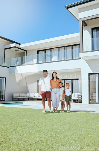 Image of Portrait, real estate and happy family moving into their new luxury home, house or property in summer. Happy parents and children standing with a smile outdoor with building investment or purchase
