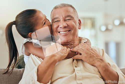 Image of Happy, grandfather and little girl kiss with hug for love and care in family bonding time or generations at home. Portrait of grandpa with smile in happiness for hugging, loving and caring grandchild