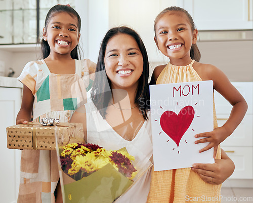 Image of Mothers day, birthday and happy family children with gift, celebration flowers and heart card to celebrate mama. Love, youth girl and portrait of kids giving mom surprise, bouquet and present box