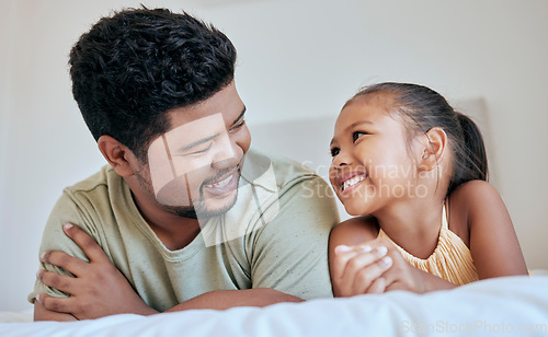 Image of Father, child and family, together on bed and happy at family home, bonding and smile, spending quality time in bedroom. Filipino, man and girl, love and care, childhood and parenthood at the house.