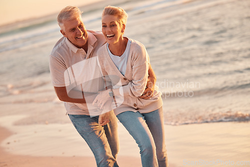 Image of Couple, retirement and travel to the beach, hug and love, fun together and spending quality time outdoor by the ocean. Senior man, woman and happy, smile on adventure and out in nature at sea.