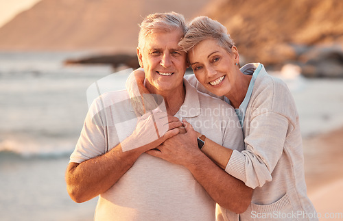 Image of Couple, senior and beach with smile, hug and love on holiday, vacation or relax with romance. Elderly, woman and man by sea, ocean or waves for portrait, together or care in retirement with happiness