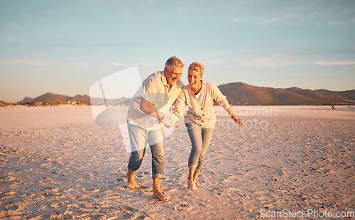 Image of Retirement, senior couple and love being on beach, sand and walking being happy, smile and relax together. Romantic, mature man and elderly woman on seaside vacation, holiday and bonding for romance.