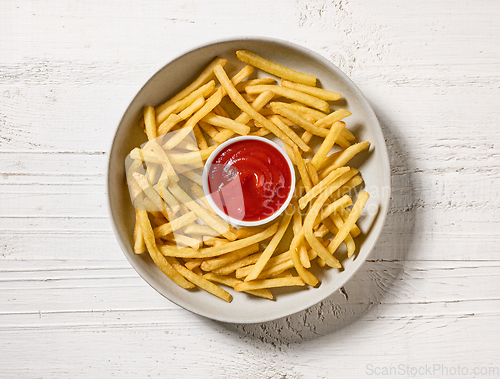 Image of french fries with tomato ketchup