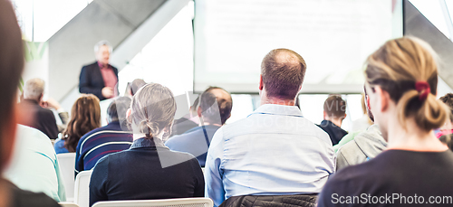 Image of Male speeker having talk at public event.