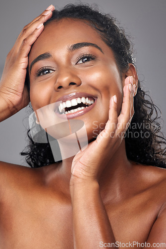 Image of Face, portrait and skincare beauty for woman with smile for facial health against grey mockup studio background. Indian model happy about natural cosmetic wellness and dermatology with mock up space