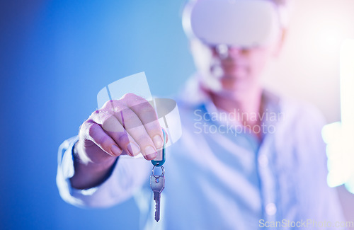 Image of Keys, virtual reality and metaverse with a hand of a man holding a key to access a digital simulation. VR, cyber security and real state with a male user opening data, software or information online