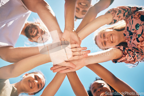 Image of Support,love and friends hands connect for collaboration, teamwork and agreement together outdoor against blue sky background. Diversity, support and community with unity, faith and trust in nature