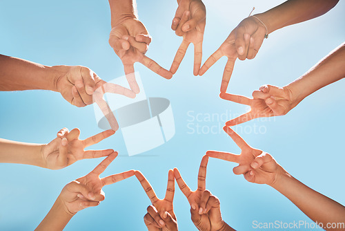 Image of Group, hands and fingers with star for peace, solidarity and blue sky in sunshine on vacation. Friends, family and fun for community, support and summer for bonding with sign, connected and together