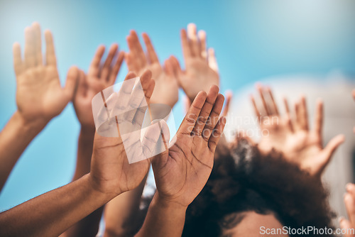 Image of Pray, hands and people praying against blue sky, united for religion, worship and praise outdoors. Community, church and hand of people in support of God, peace and love by group in spiritual prayer