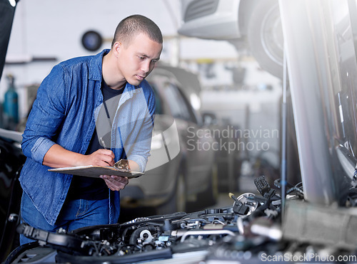 Image of Car service, inspection and mechanic by car with clipboard checking engine. Technician, engineer and man working in garage or workshop writing notes for repair, maintenance and motor care for vehicle