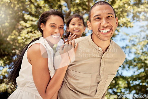 Image of Family, couple and child being happy, smile and relax for fun, vacation and joy together outdoor. Portrait, man and woman with kid have quality time, bonding and embrace being playful and cheerful.