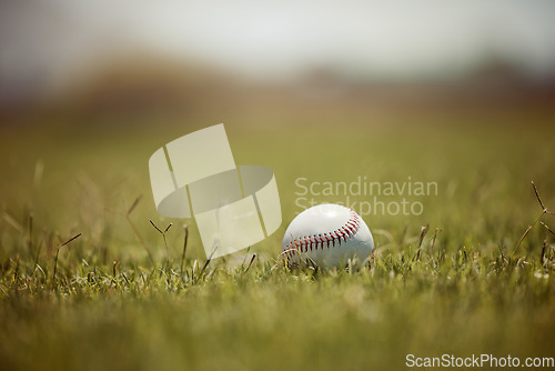 Image of Baseball, pitch and sports ball on grass on an outdoor field for a game, training or practice. Softball, sport and closeup of equipment for match, practicing or exercise in nature at outside stadium.