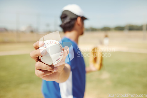 Image of Baseball player, ball and man hands in fitness game, workout match or training competition sports field. Zoom, softball player and pitcher athlete ready to throw for goals in stadium summer exercise