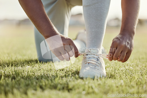 Image of Baseball field, man and shoes lace tie for sports match with professional game uniform for pitch. Baseball, start and athlete male footwear preparation for sport competition tournament on grass.